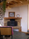 La Banquette et la Cheminee du gite d'Appy en Vallées d'Ax 